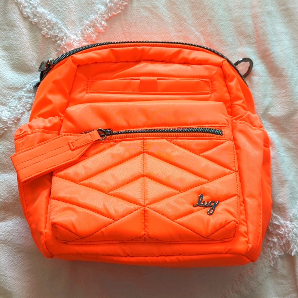 Brand New, never used Lug Alpine Crossbody in Coral!